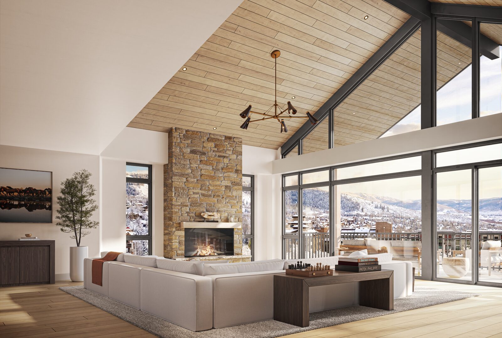 Penthouse living room with vaulted ceilings and mountain views.