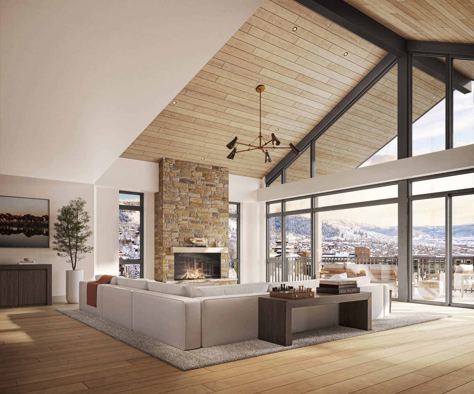 Penthouse living room with vaulted ceilings and mountain views.